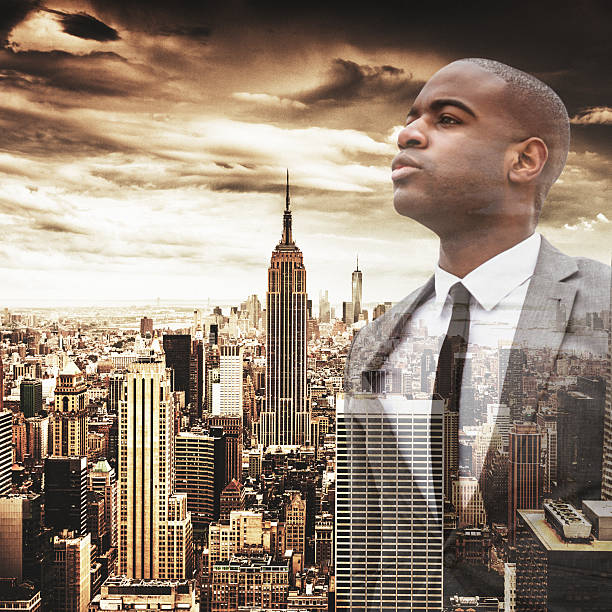 istock Successful business man looking away against the skyline 500006684