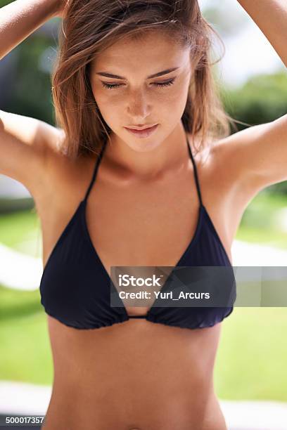 She Pretends Not To Notice The Jaws Dropping Around Her Stock Photo - Download Image Now