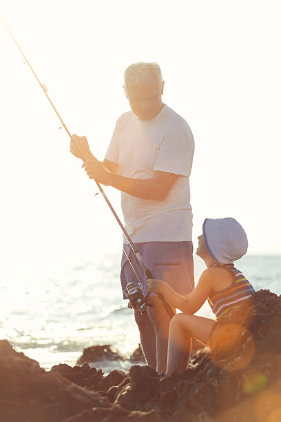 istock Father and Son Fishing Together. 500018063