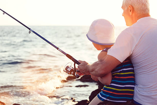 istock Father and Son Fishing Together. 500018069