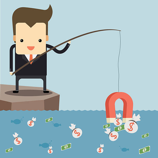 istock Businessman fishing money by red magnet 500018831