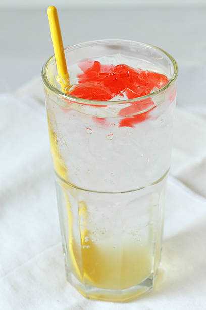istock glass of lime soda drinks with red jelly 500021627