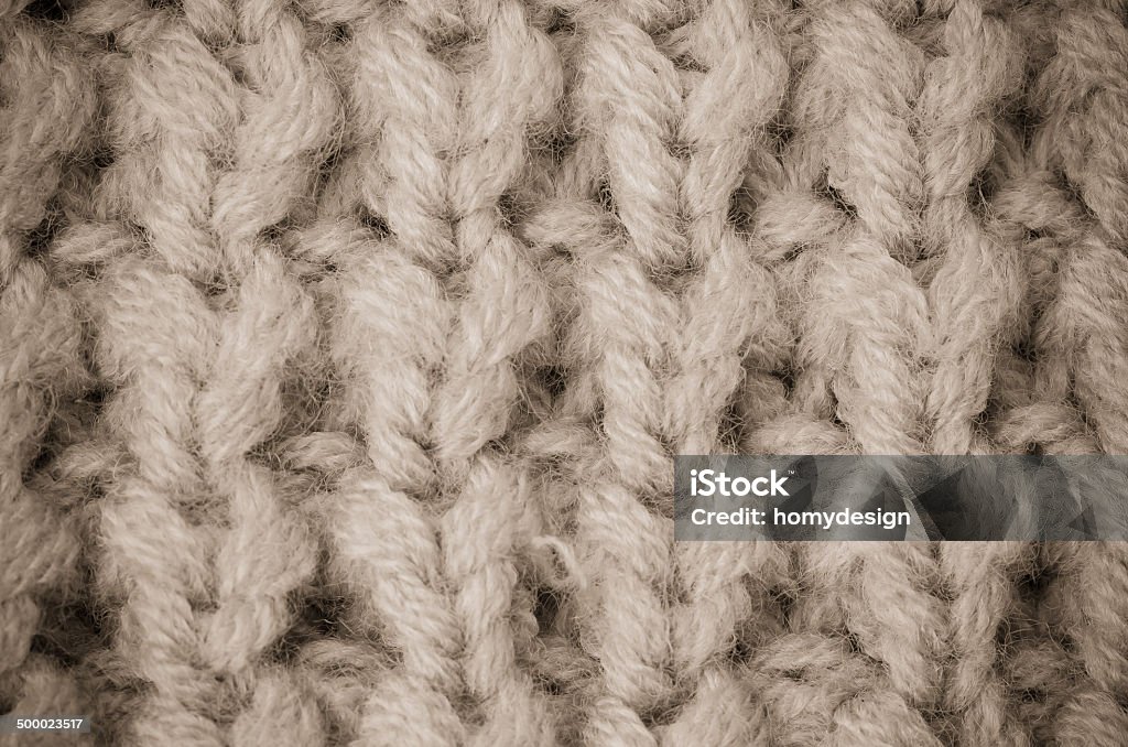 Beige knitted wool Beige knitted wool texture can use as background. Abstract Stock Photo