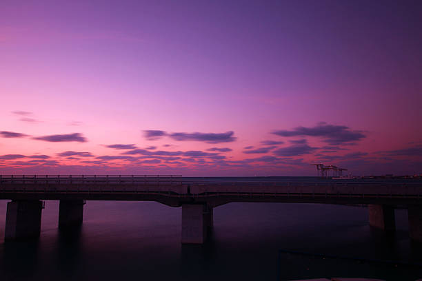 istock Beautiful sunset in Naminouegu bridge, Okinawa, Japan 500031078