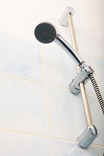 istock Closeup of shower head in bathroom. 500032716