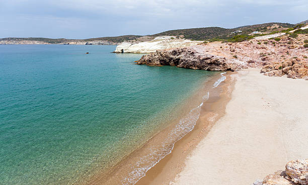 Triades are three sandy isolated beaches located at the west coast of the island the one next to the other. The landscape is pastoral, with yellow sand  and surrounded by rocks.