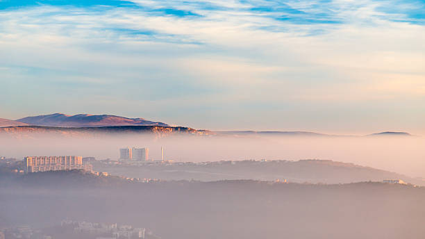 istock foggy sunset in the bay of Trieste 500034344
