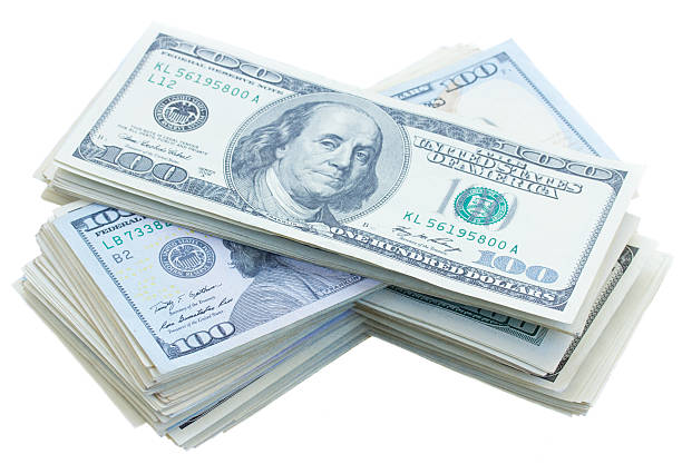 istock thre piles of dollars money 500036770