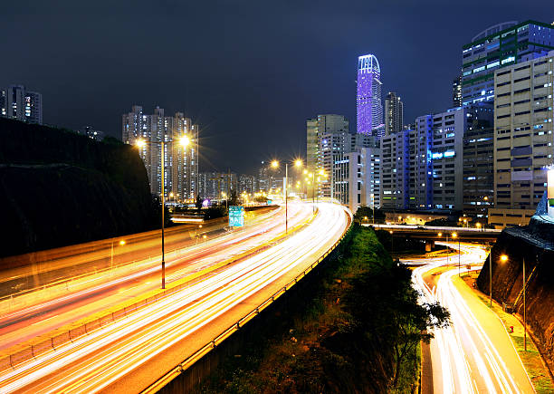 istock moving car with blur light through city at night 500036917