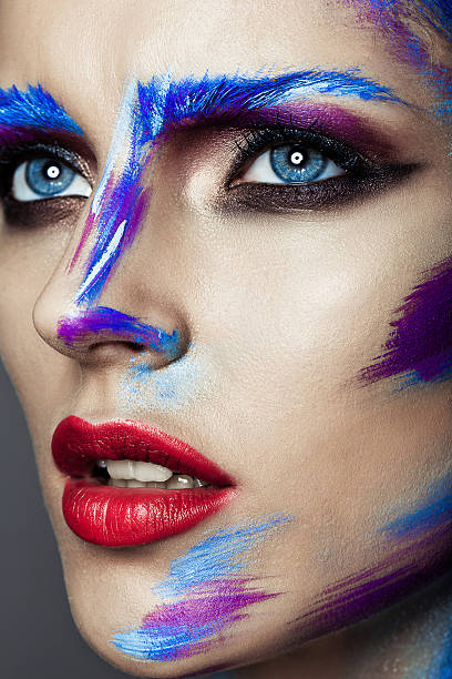 istock Creative art makeup of a young girl with blue eyes 500038343