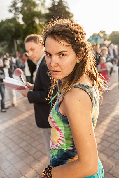 istock People in bright clothes with pacifist flag 500040587
