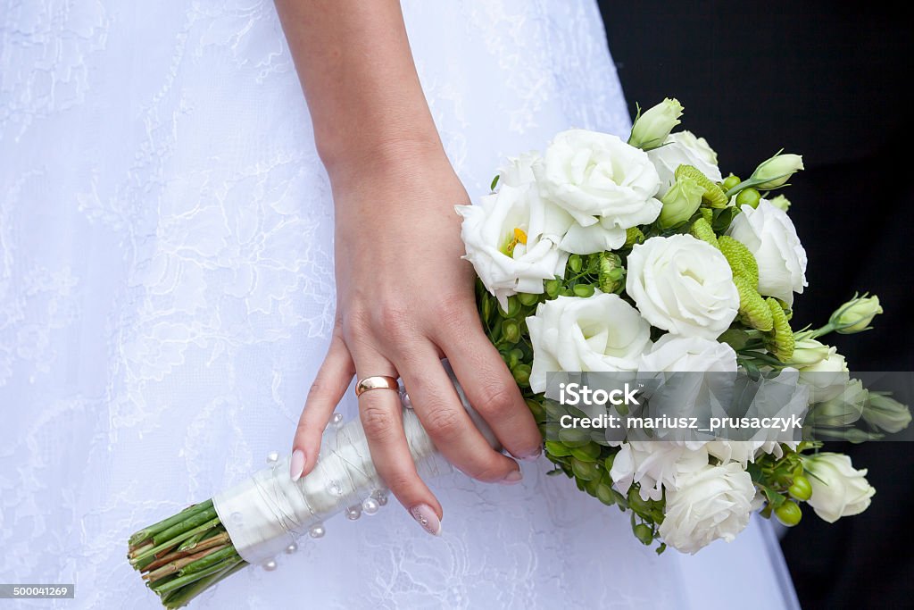 Beautiful wedding bouquet in hands of the bride Adult Stock Photo
