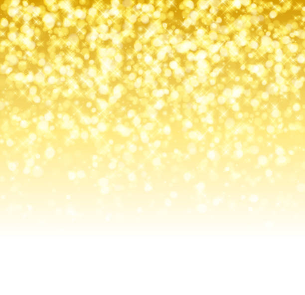 istock Glitter glow sparkles yellow golden magical background. New year party 500044266