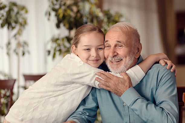 istock Young girl and grandfather 500049540