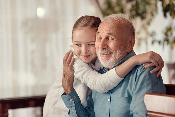istock Young girl and grandfather 500049612
