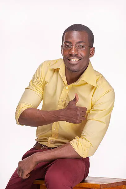 Photo of portrait of handsome young black african smiling man