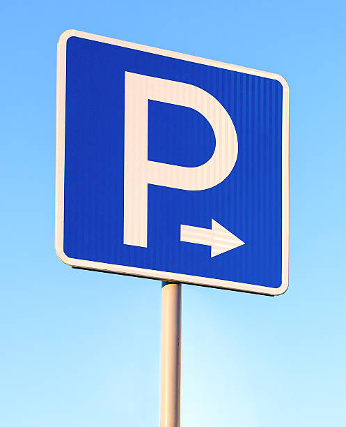 istock Close-up of a parking sign against blue sky 500060334