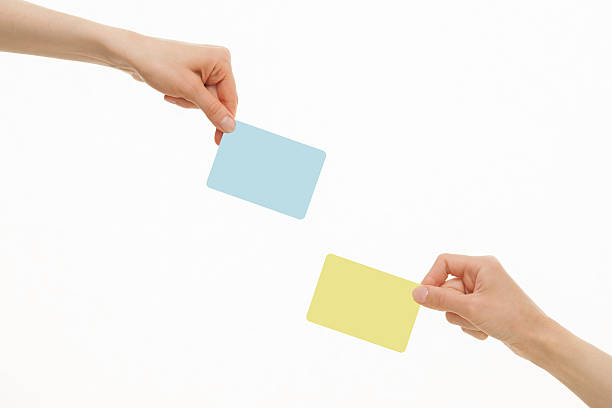 istock Human hands holding colorful paper cards 500063658