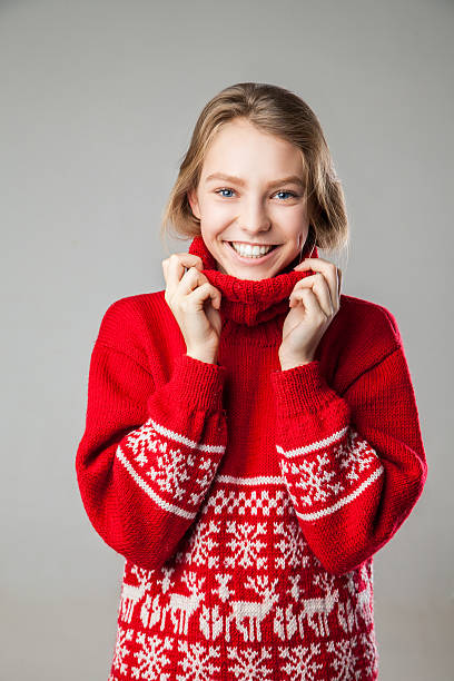 istock Girl wrapped in a warm knitted sweater. 500073458