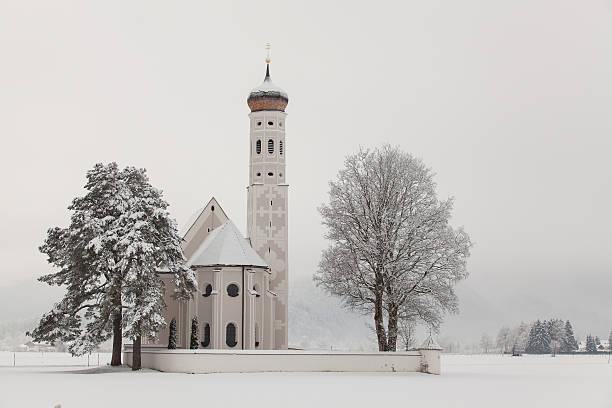 istock St. Coloman Church in winter landscape 500073640