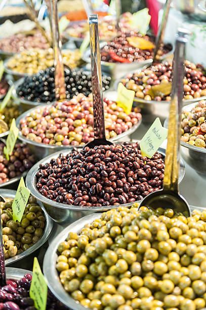 istock Different marinated olives on street market 500074306