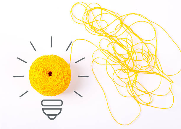 istock Inspiration concept yarn yellow light bulb metaphor for good idea. 500074342