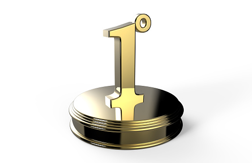 Gold number 1 on podium isolated on a white background