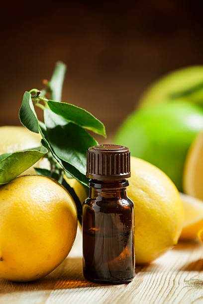 istock Essential oil of lemon and fresh lemons 500076952