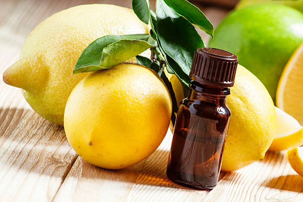 istock Essential oil of lemon and fresh lemons 500077754