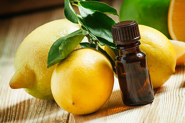 istock Essential oil of lemon and fresh lemons 500077916