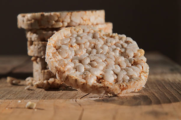 istock Galette rice on old wooden table dark background 500088764