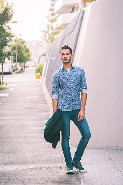 istock Young handsome man posing in the city streets 500092240