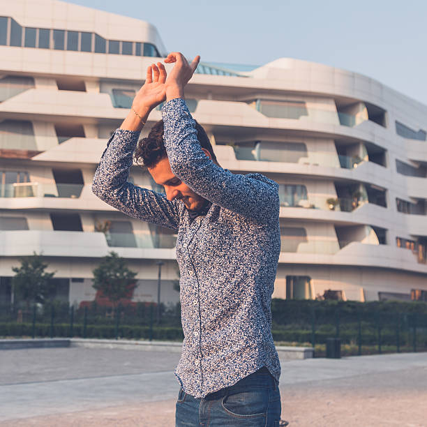 istock Young handsome man posing in the city streets 500093318