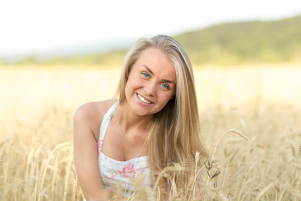 istock girl in rye field 500095740