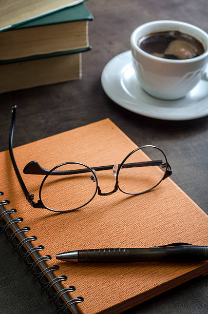 istock Stack of books and a pair of glasses 500096512