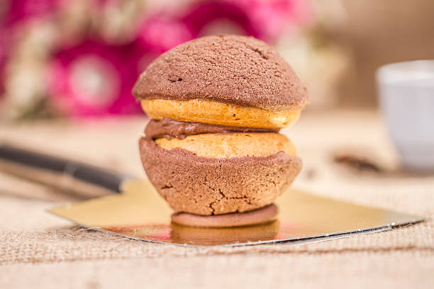 dutch cookies "bitterkoekjes'a straw saco con chocolate - almond macaroon fotografías e imágenes de stock