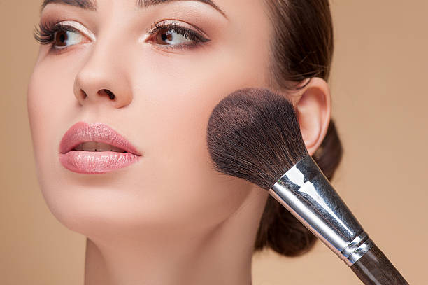 istock Attractive young woman is getting make-up at salon 500108454