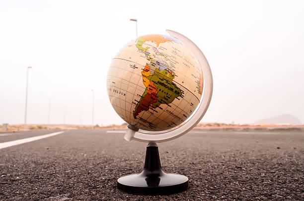 istock Globe Earth on an Asphalt Street 500109162