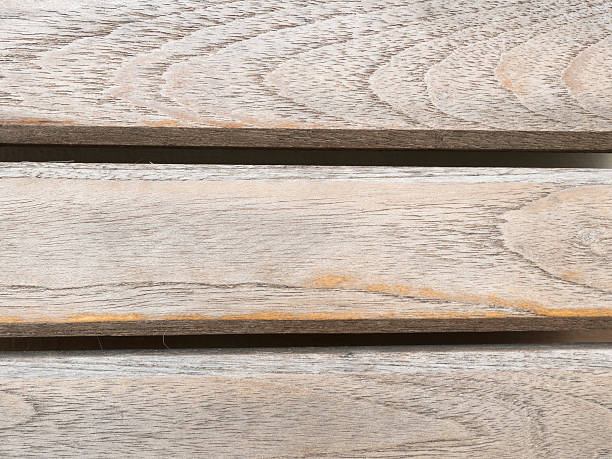 istock Dark brown wood plank with background. 500112810