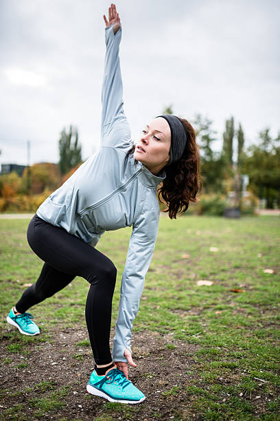 istock fitness woman doing exercise on the park 500112950