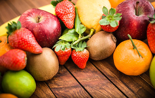 istock bunch of tropical fruit on the table 500113244