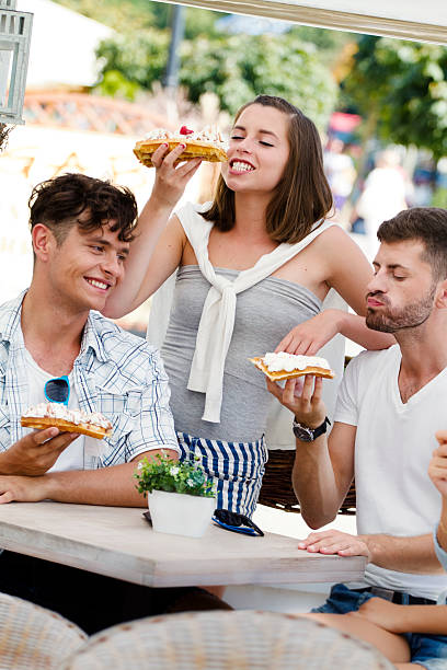 istock Friends eating dessert 500118333