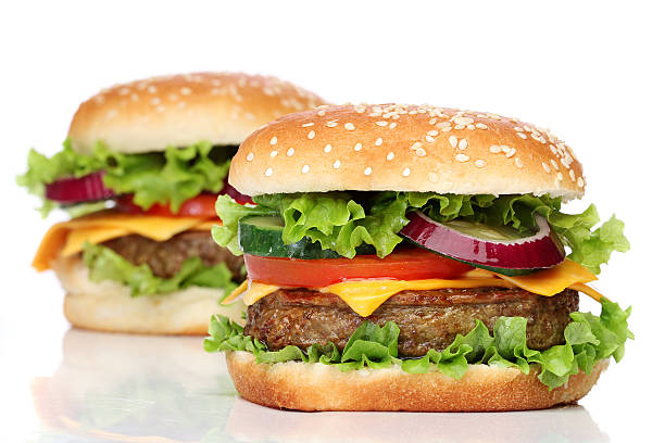 istock Two delicious hamburgers isolated on white background 500119731