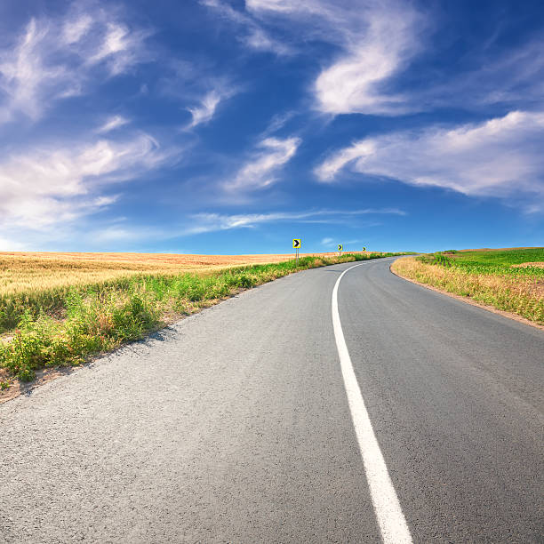 istock Driving on an empty asphalt road at sunny day 500119909