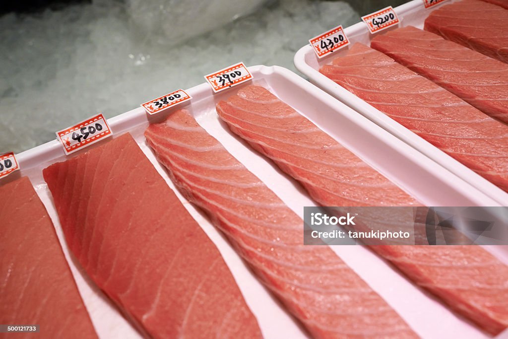Tuna Slices on Sale Prime cuts of tuna on sale at Tsukiji Fish Market. Chuo Ward. Tokyo. Japan. Fish Market Stock Photo