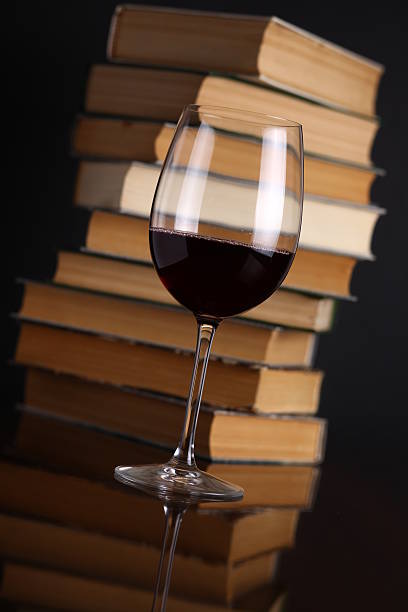 istock Wine glass and books 500122449