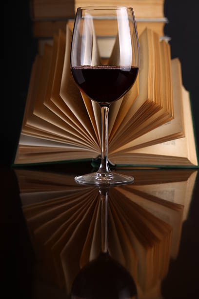 istock Wine glass and books 500122463