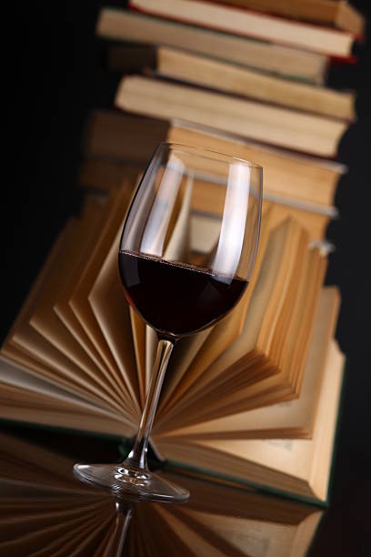 istock Wine glass and books 500122469
