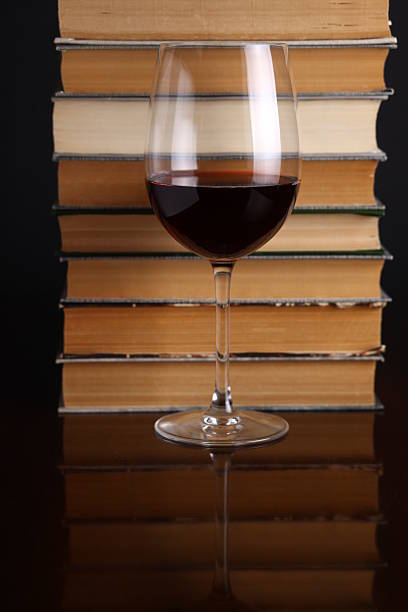 istock Wine glass and books 500122897