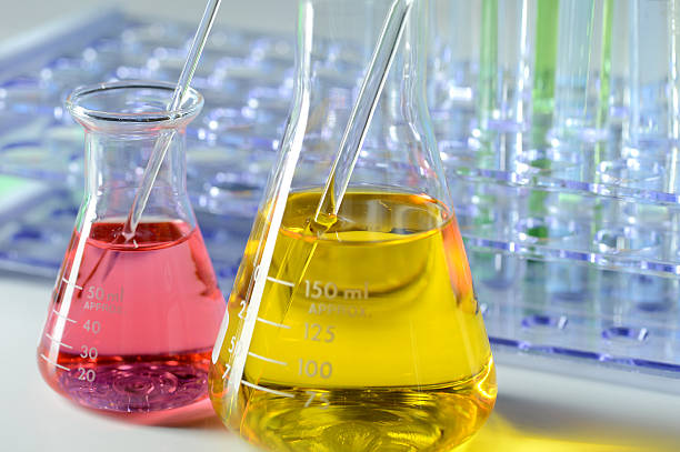 istock Laboratory Glassware With Color Liquids 500134586